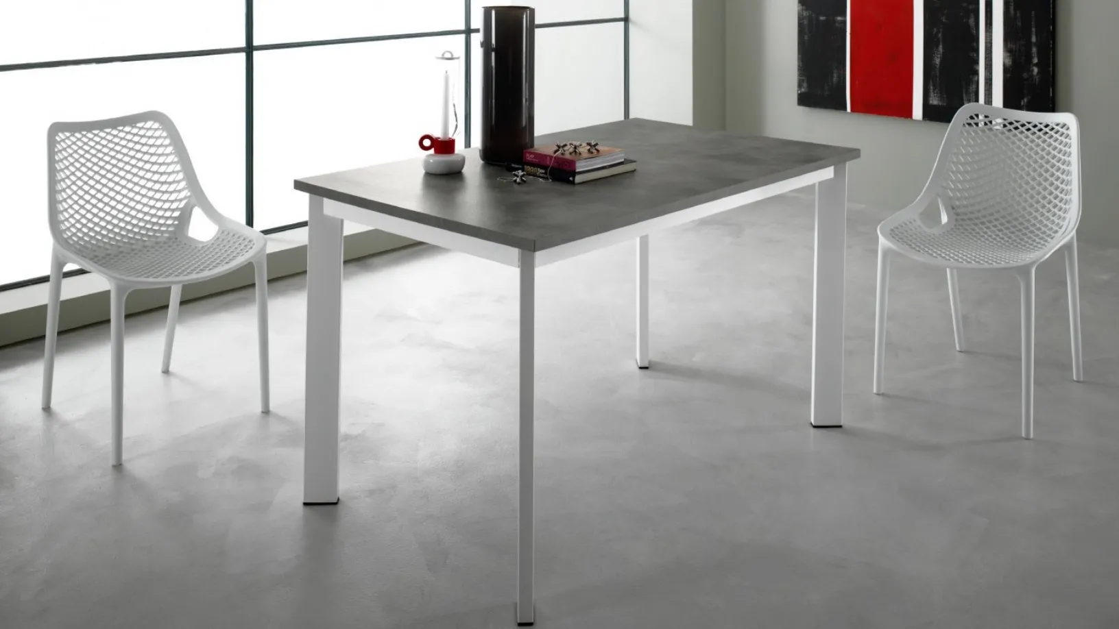 Tavolo allungabile con piano in laminato e metallo laccato Evo di Eurosedia